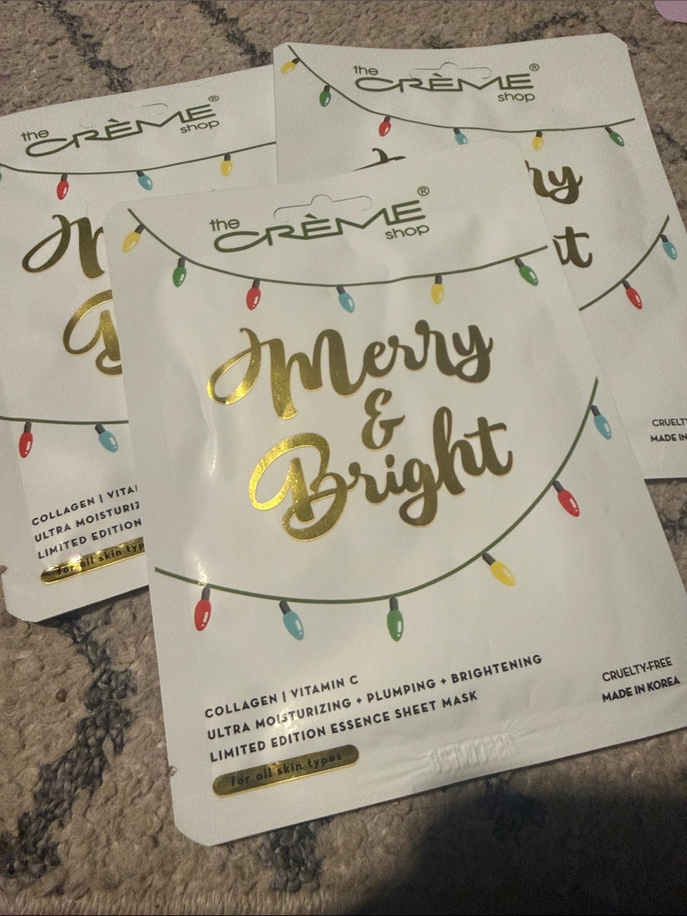 5/$25 The Crème Shop Merry & Bright Gold Holiday Essence Sheet Mask - set of 3